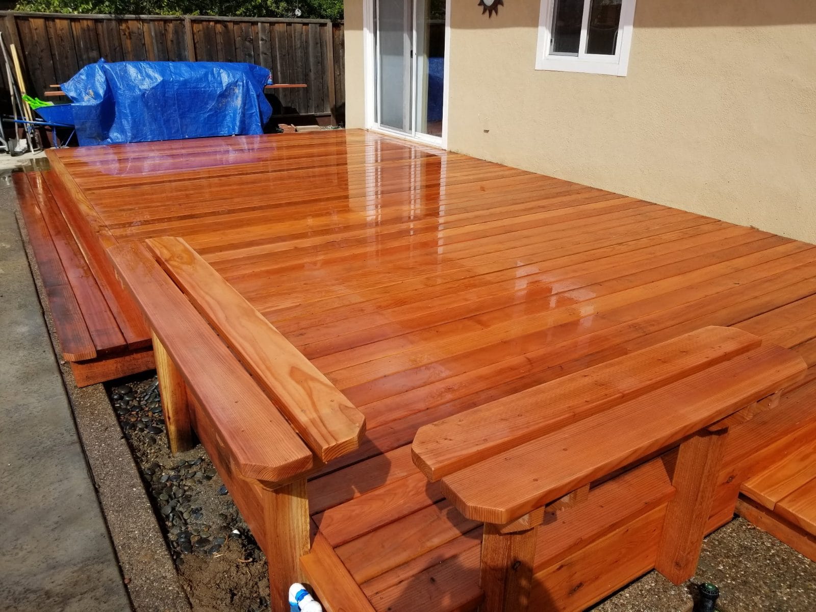 Wood deck with built-in benches along the edge