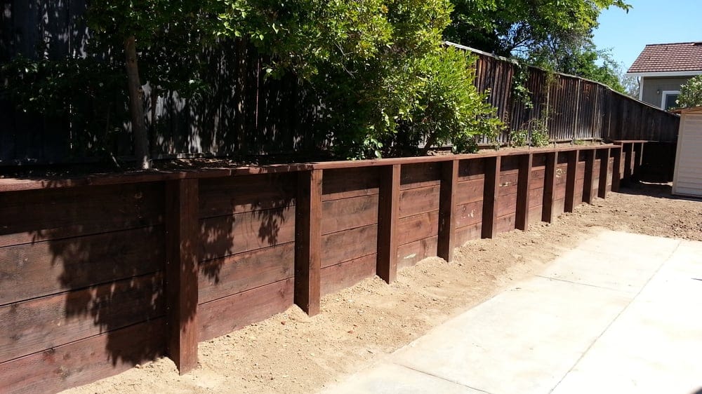 Redwood retaining wall with cap