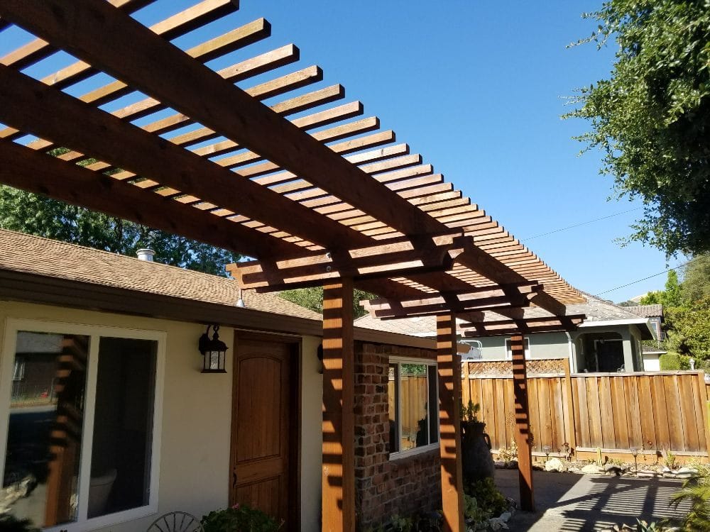 Redwood entry trellis over a walkway